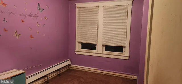 a view of a room with a window