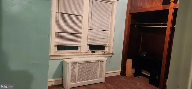 a kitchen with a stove and a refrigerator