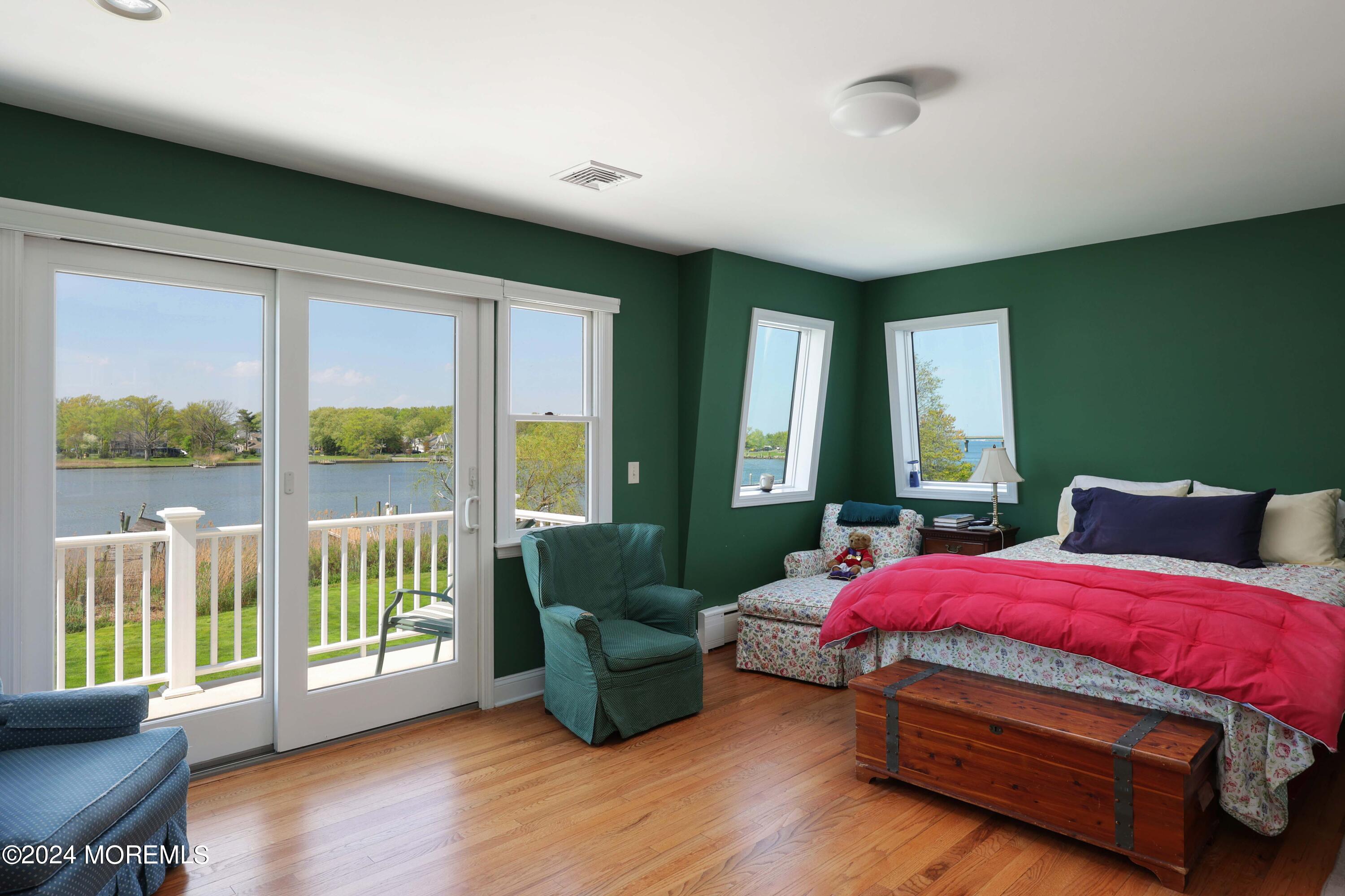 121 Horseneck Road Oceanport, NJ 07757 - Photo 18 of 48 a bedroom with furniture and a large window