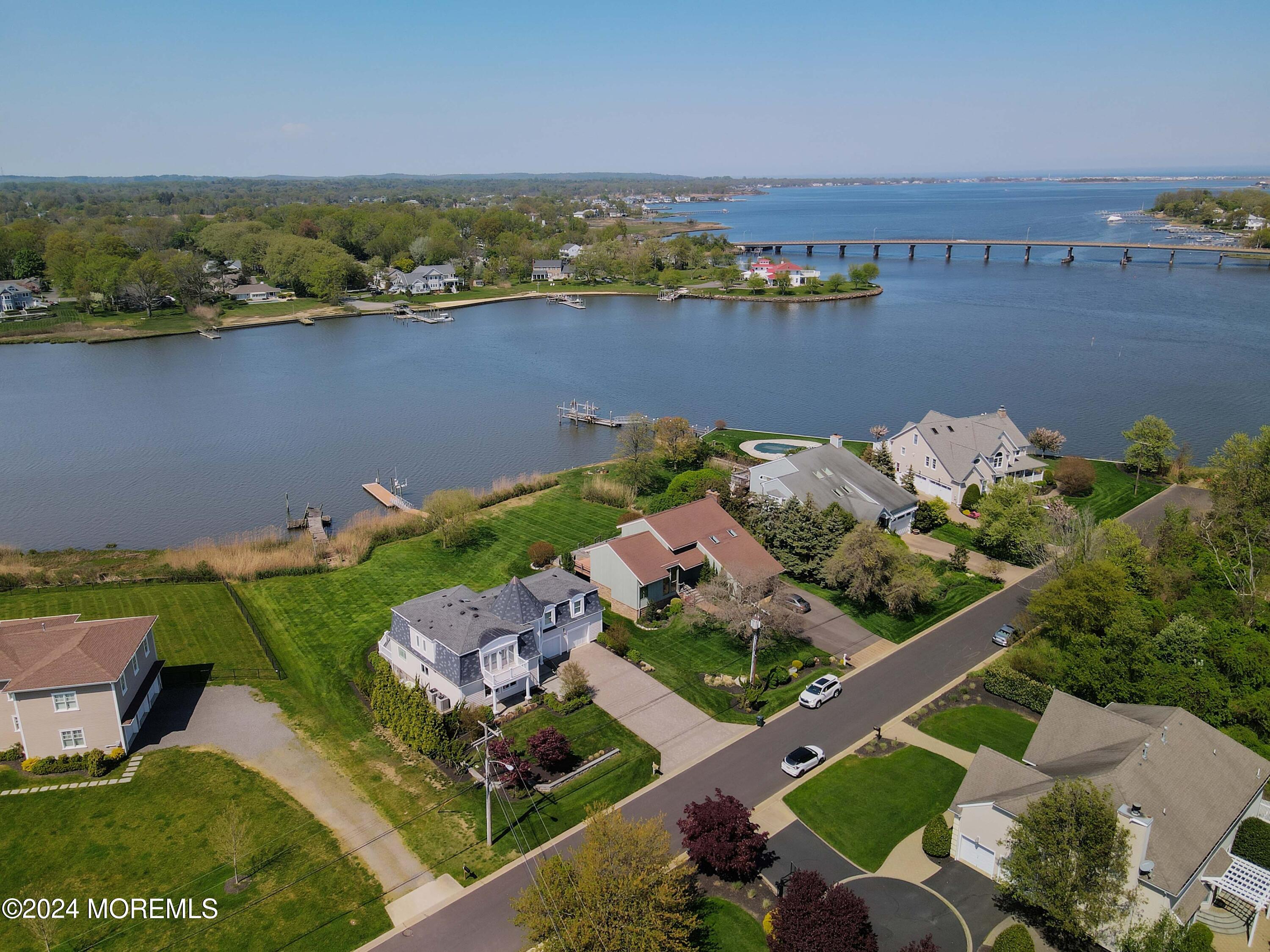 121 Horseneck Road Oceanport, NJ 07757 - Photo 2 of 48 an aerial view of a house with a lake view