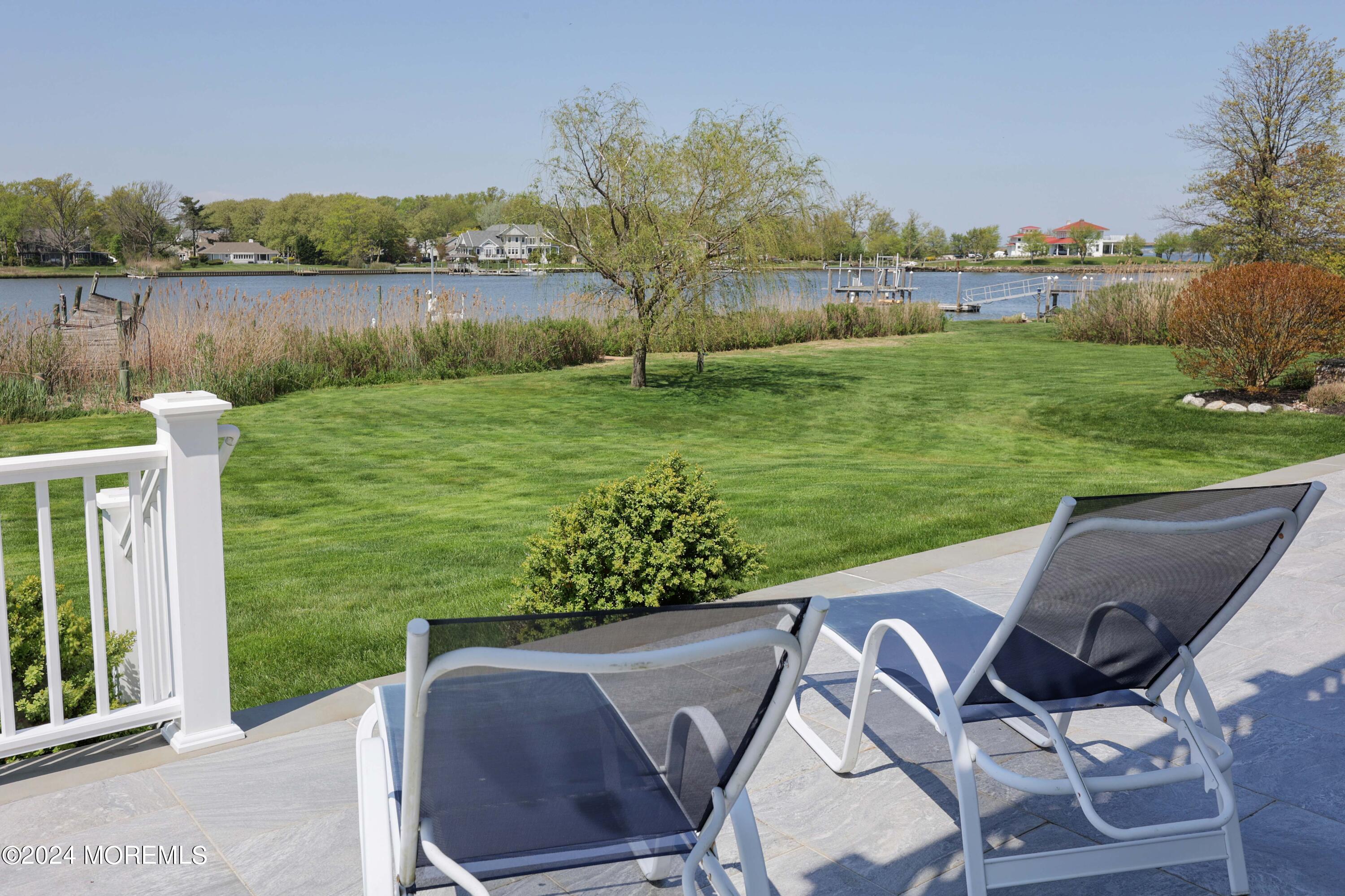 121 Horseneck Road Oceanport, NJ 07757 - Photo 30 of 48 a view of a lake with a yard and lake view
