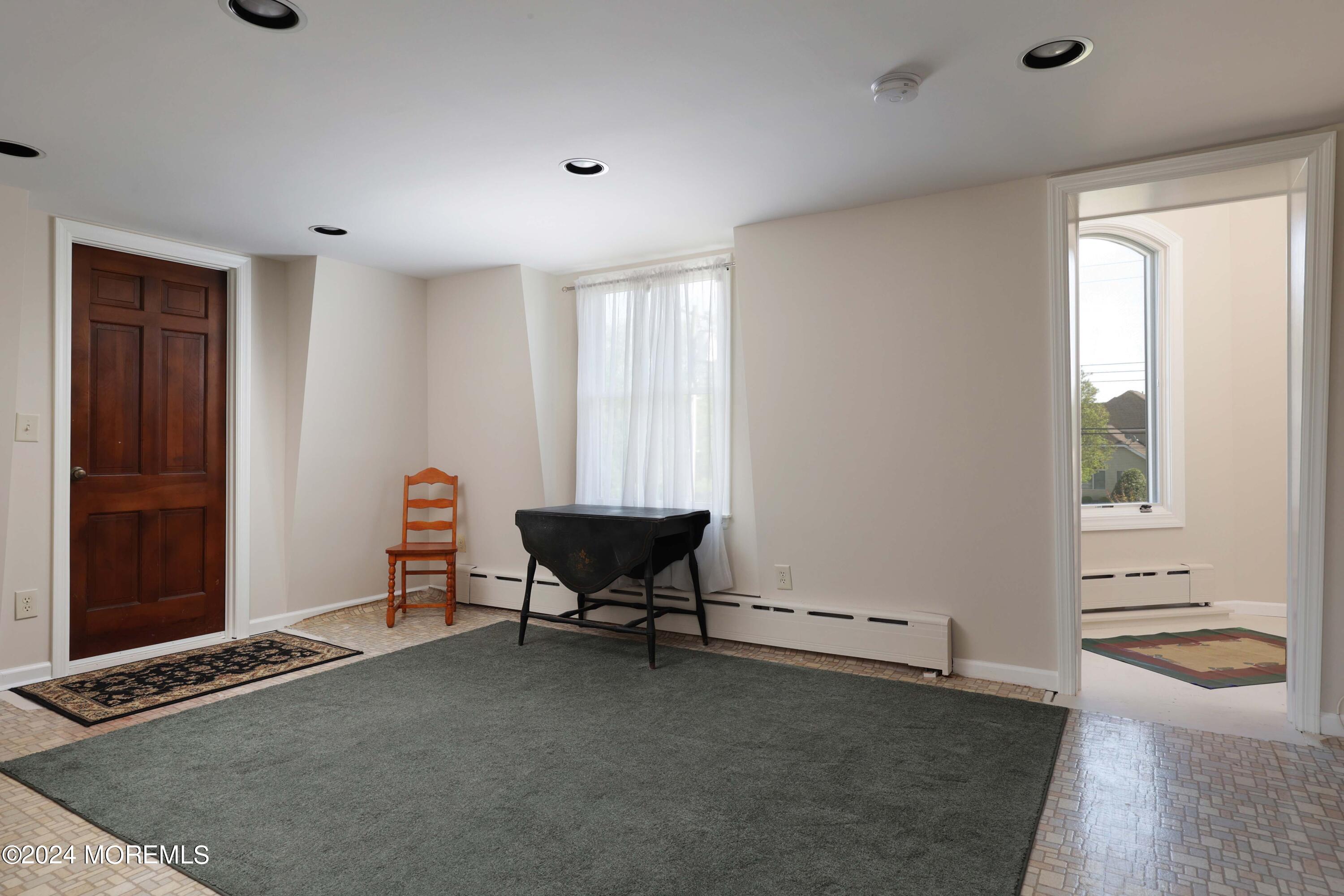 121 Horseneck Road Oceanport, NJ 07757 - Photo 34 of 48 a view of an empty room with a window