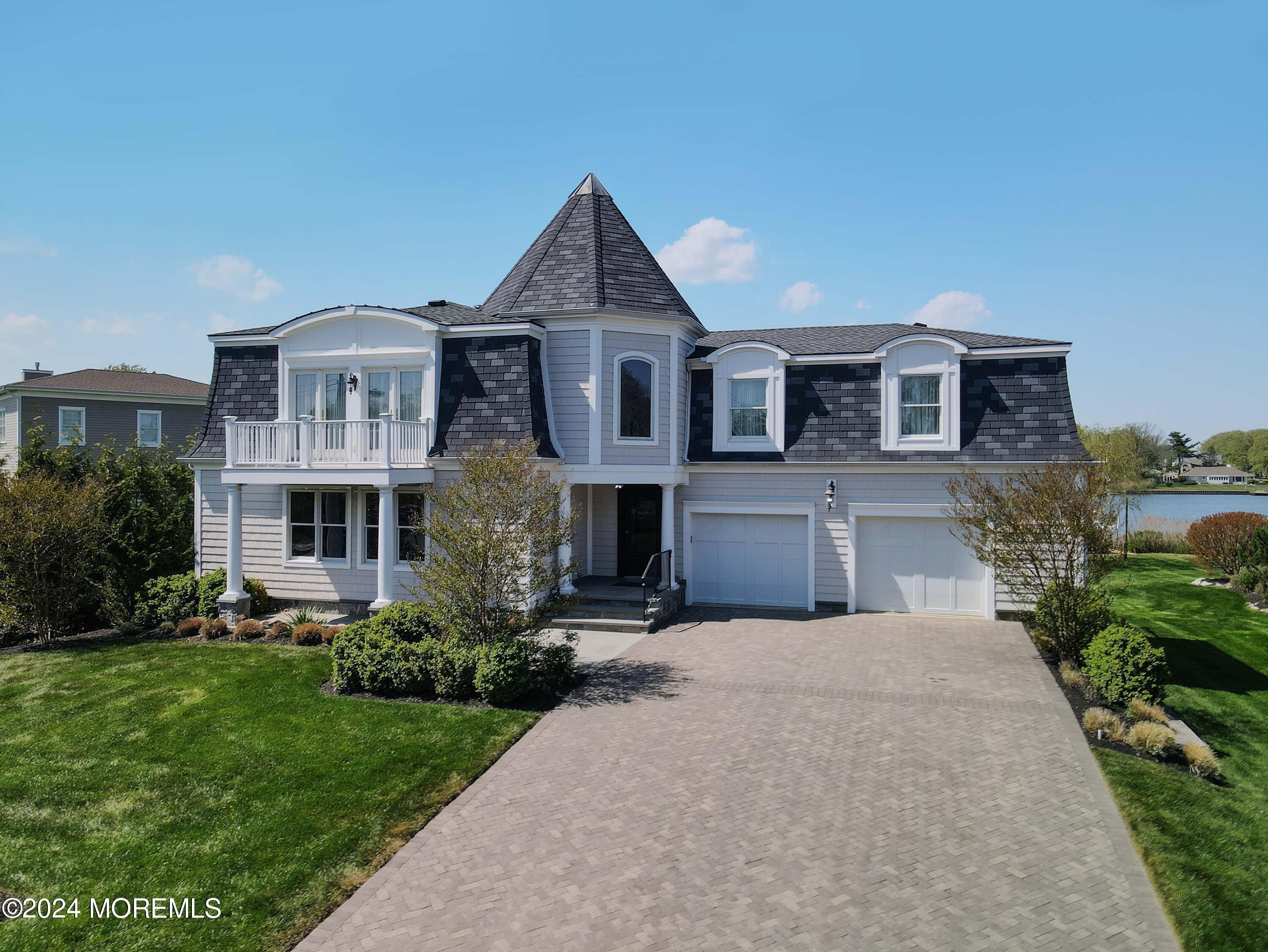 121 Horseneck Road Oceanport, NJ 07757 - Photo 35 of 48 a front view of a house with a yard and garage