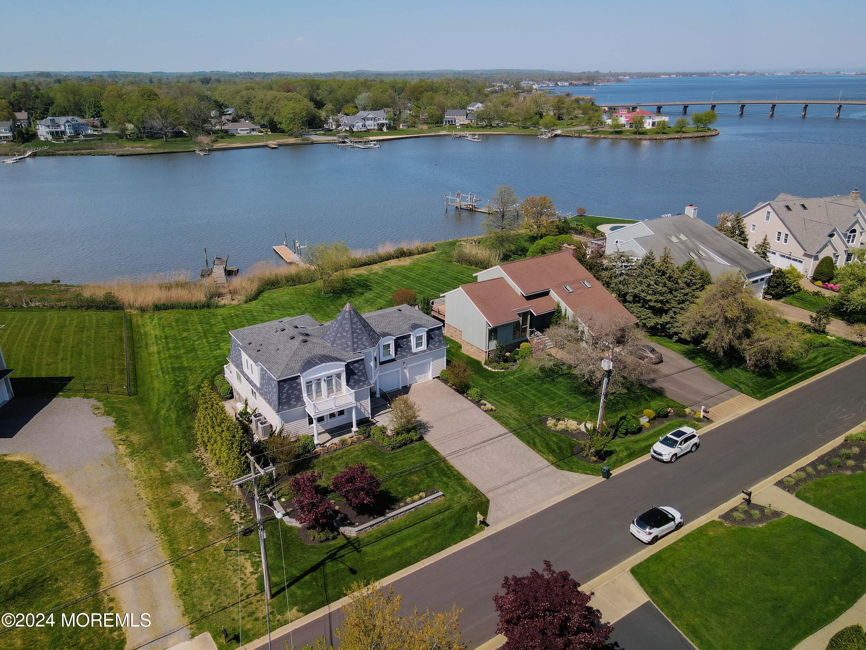 121 Horseneck Road Oceanport, NJ 07757 - Photo 37 of 48 an aerial view of a house with a lake view