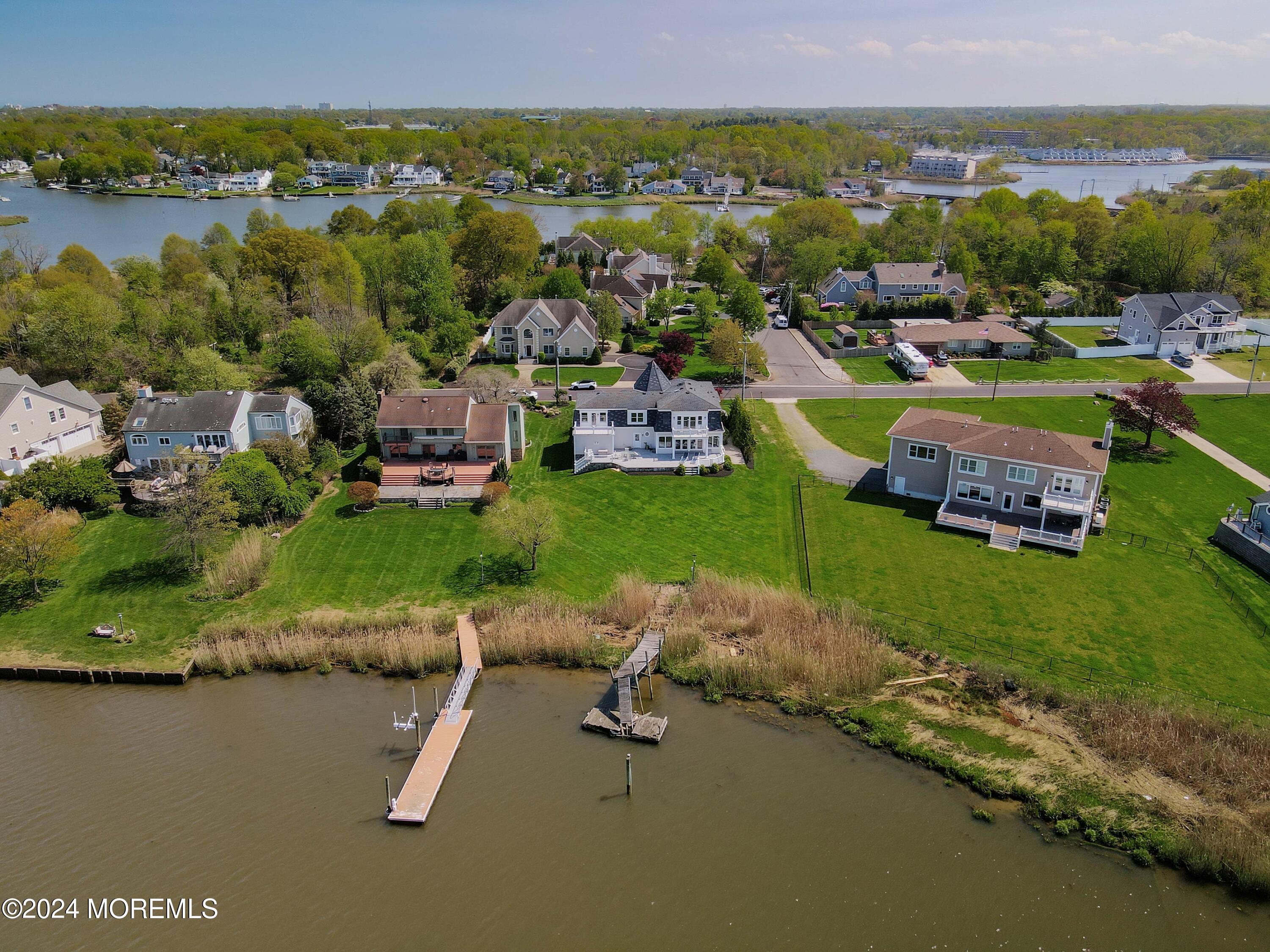 121 Horseneck Road Oceanport, NJ 07757 - Photo 38 of 48 an aerial view of a house with a lake view