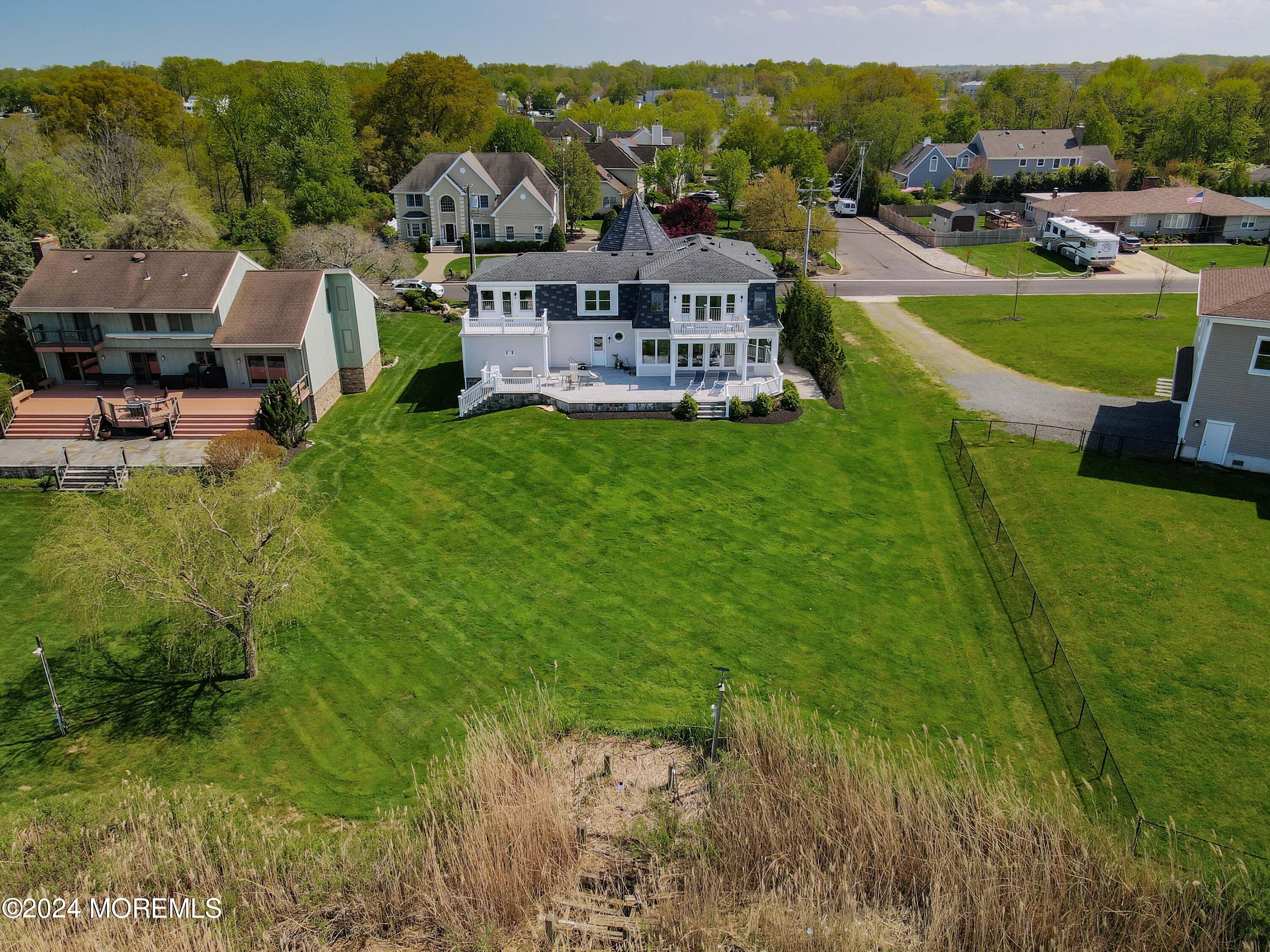 121 Horseneck Road Oceanport, NJ 07757 - Photo 40 of 48 a view of a house with a big yard
