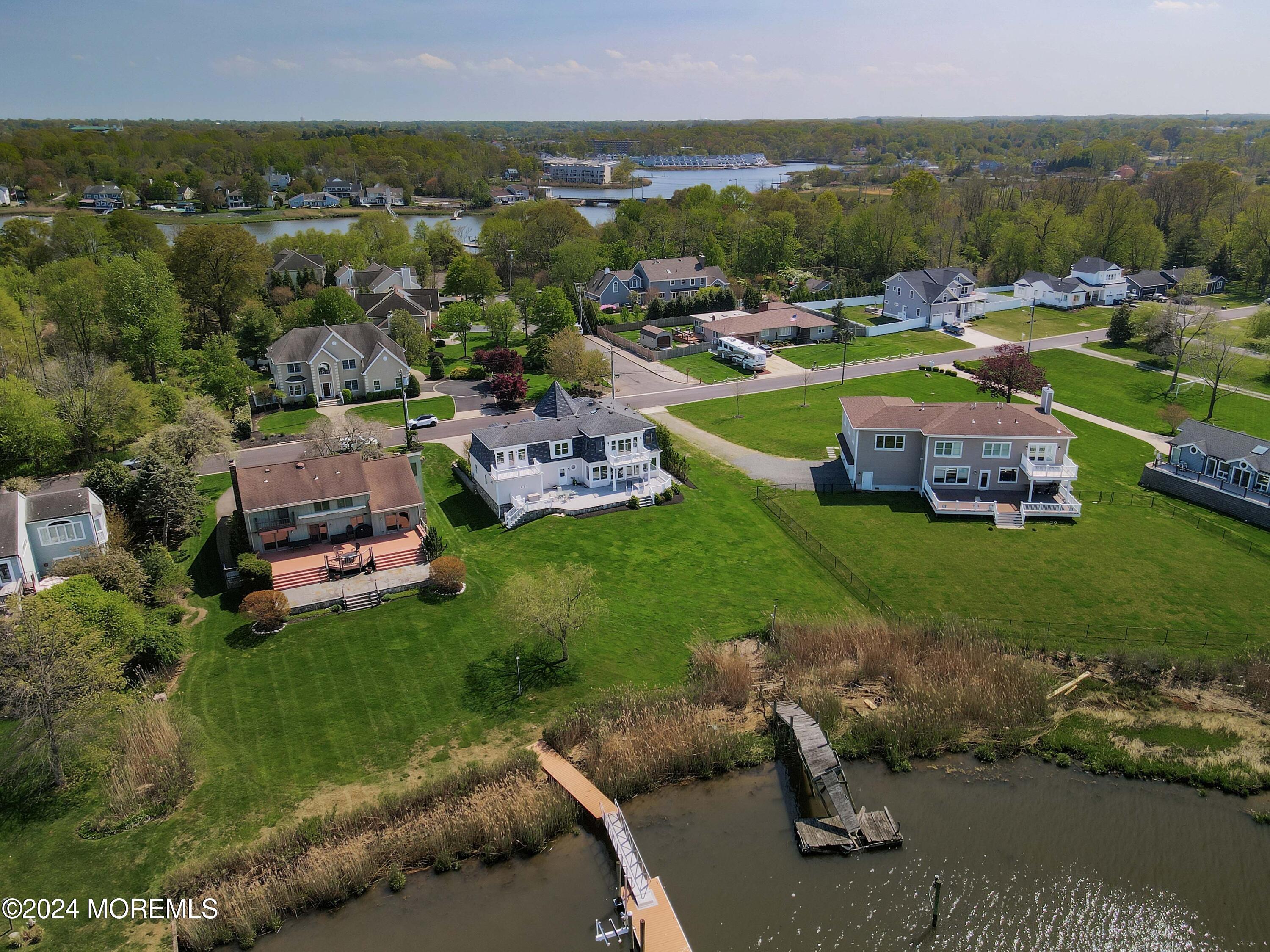 121 Horseneck Road Oceanport, NJ 07757 - Photo 45 of 48 an aerial view of a house with a garden and lake view