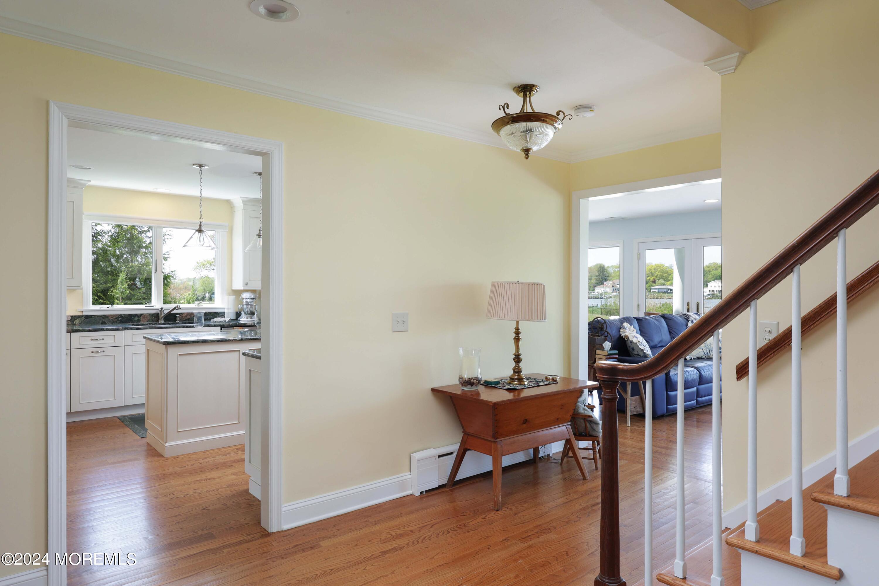 121 Horseneck Road Oceanport, NJ 07757 - Photo 8 of 48 a view of a livingroom with furniture wooden floor and staircase