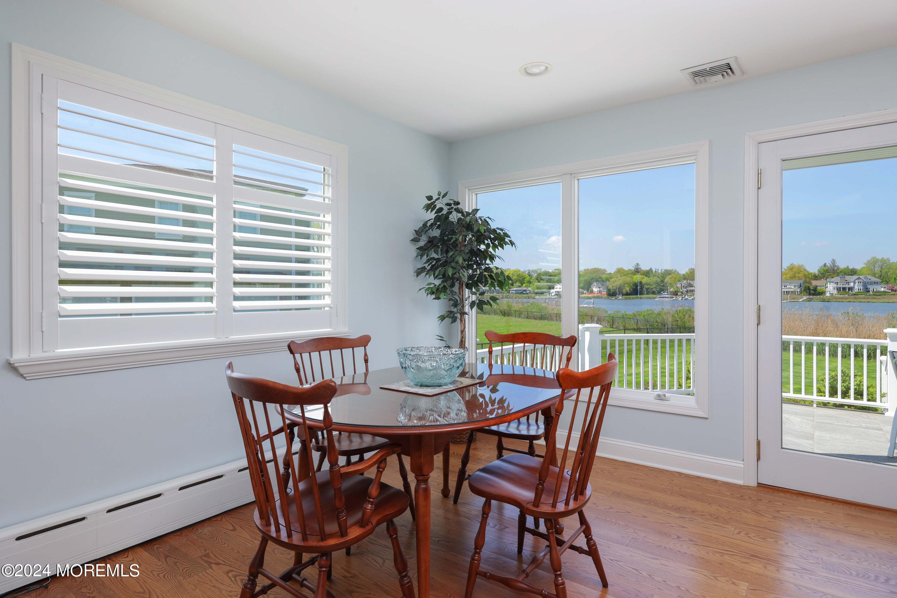 121 Horseneck Road Oceanport, NJ 07757 - Photo 9 of 48 a dining room with furniture and wooden floor