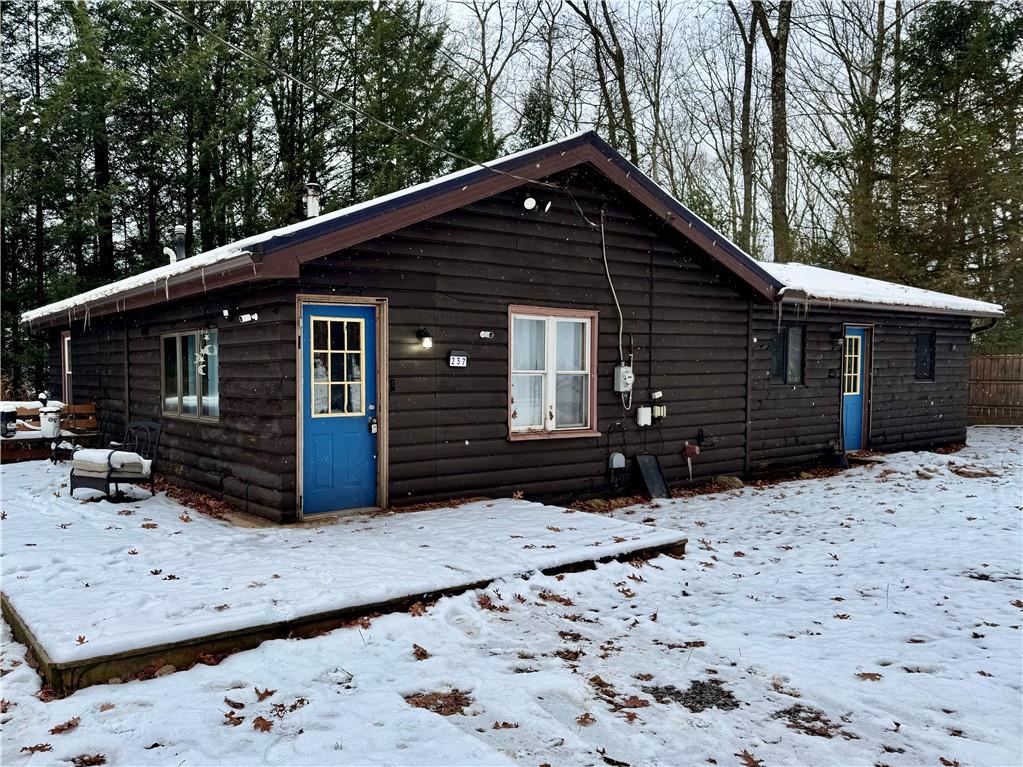 a front view of house with pathway