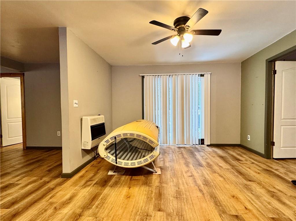 237 Mason Street Kennerdell, PA 16374 - Photo 15 of 25 a bedroom with a bed and a chandelier