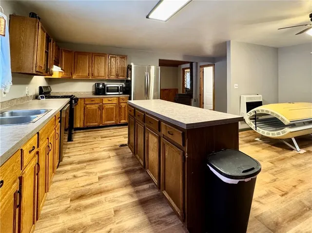 a bedroom with a bed and cabinets