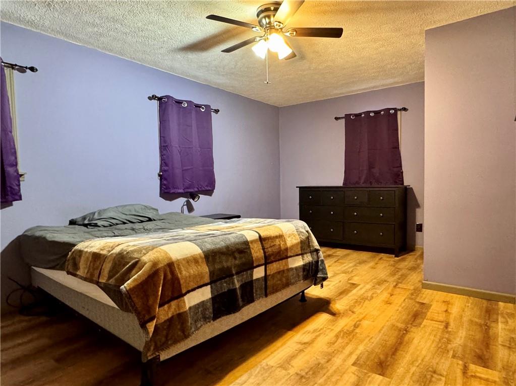 237 Mason Street Kennerdell, PA 16374 - Photo 21 of 25 a bedroom with a bed and window