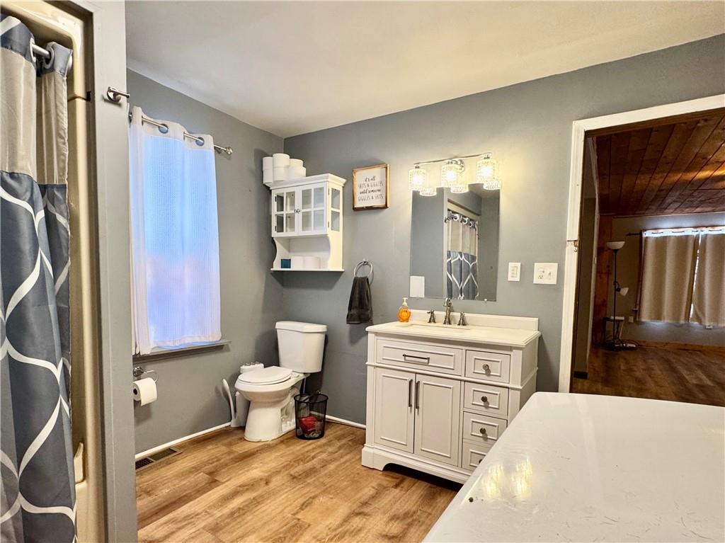 237 Mason Street Kennerdell, PA 16374 - Photo 23 of 25 a bathroom with a toilet sink and mirror