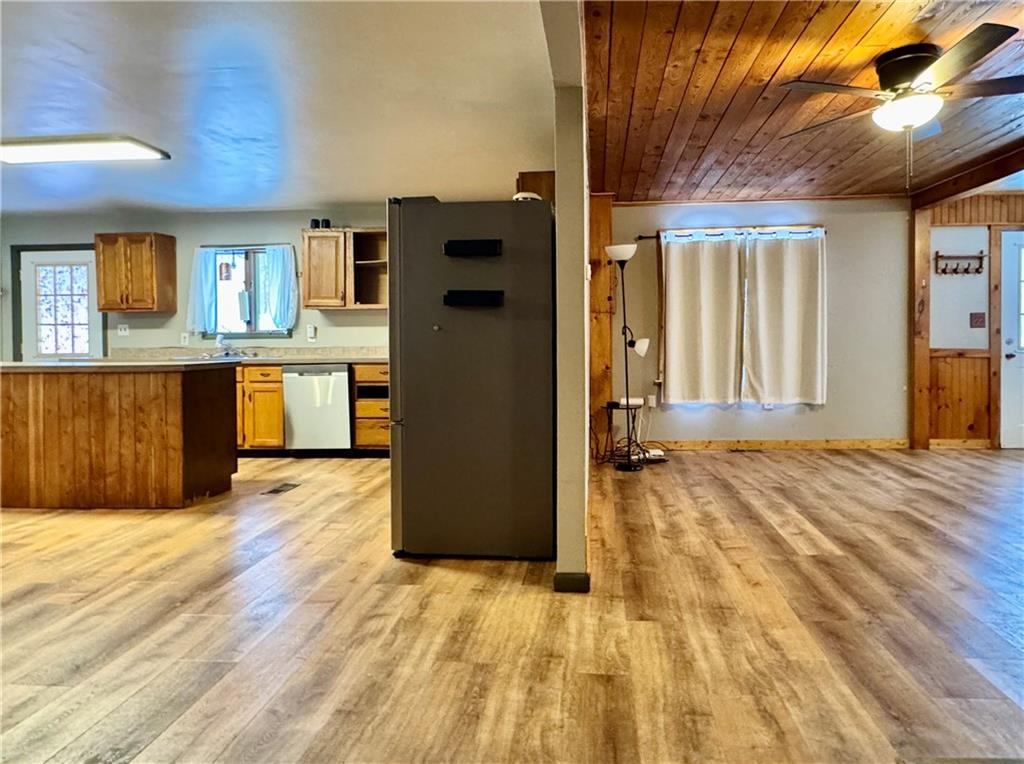 237 Mason Street Kennerdell, PA 16374 - Photo 8 of 25 a view of a kitchen with a sink and a refrigerator