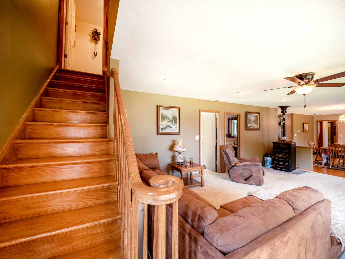 20806 Lembcke Road Harvard, IL 60033 - Photo 12 of 44 a view of a livingroom with furniture and staircase