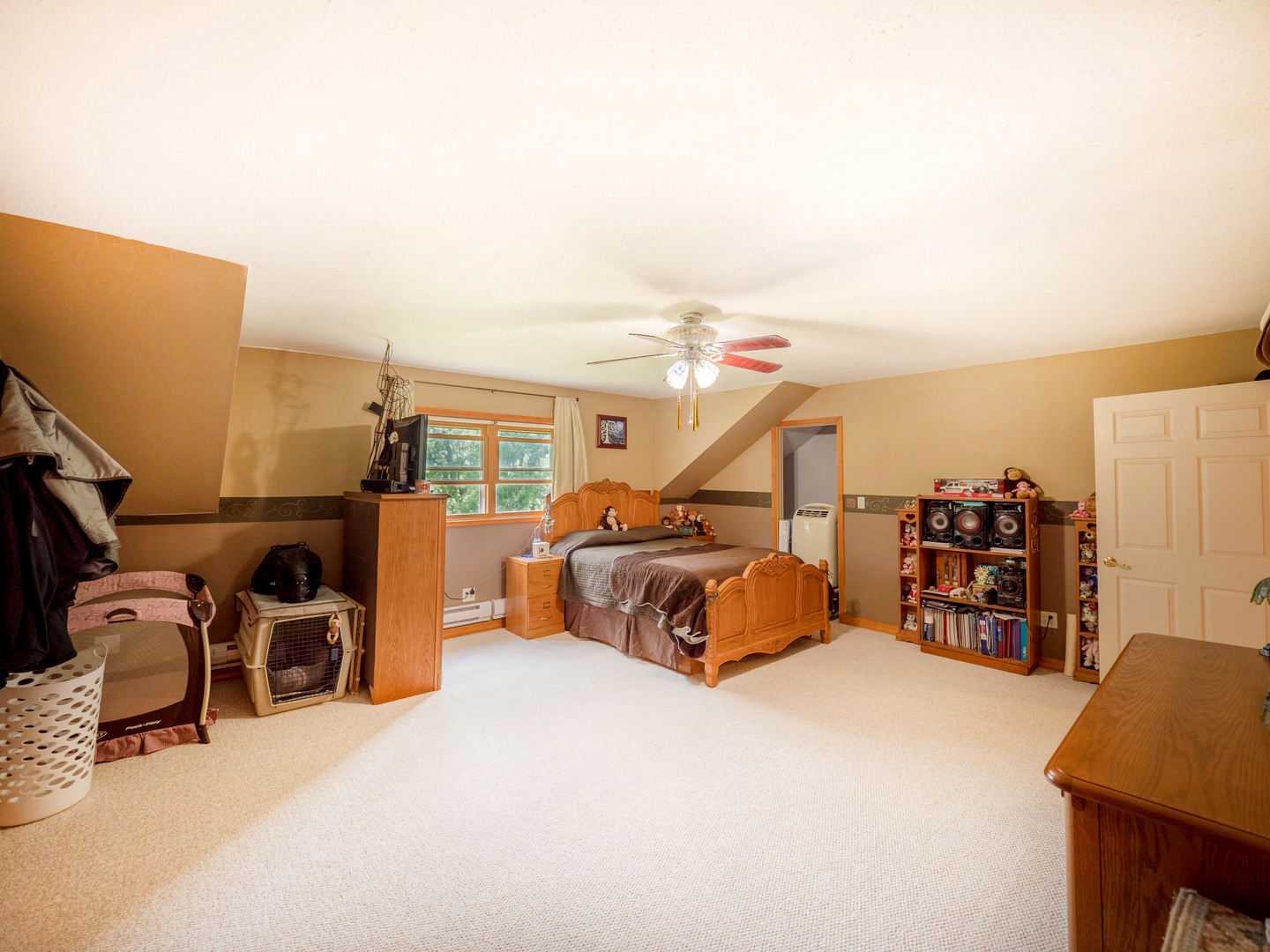 20806 Lembcke Road Harvard, IL 60033 - Photo 20 of 44 a bedroom with furniture and a large window