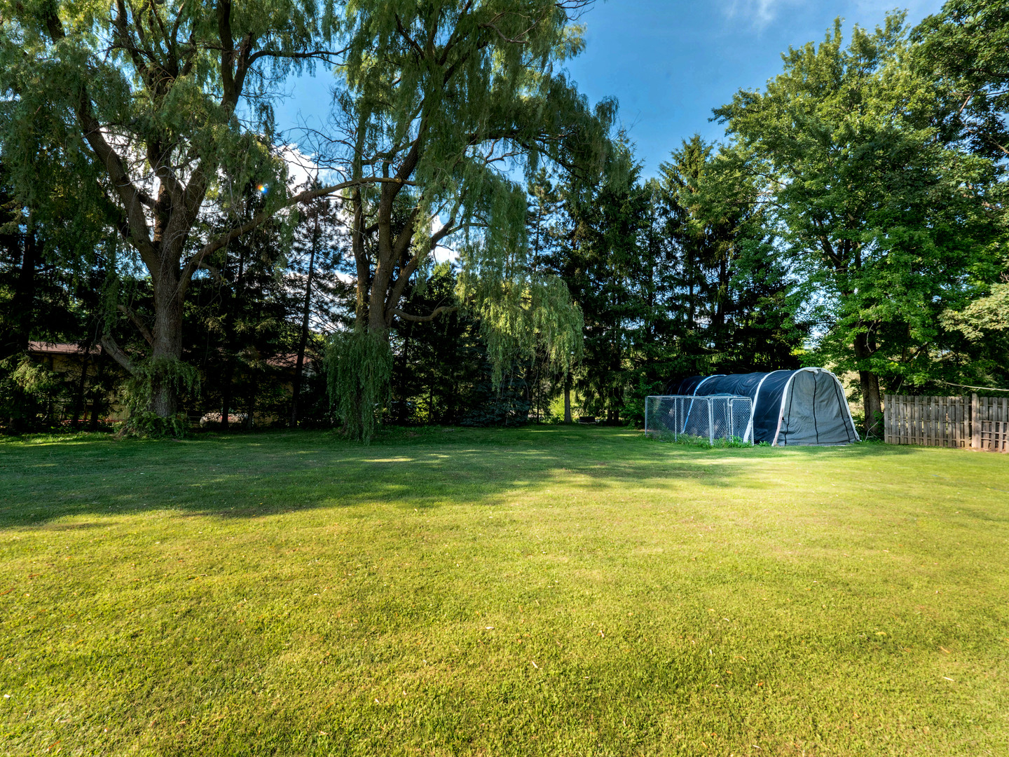 20806 Lembcke Road Harvard, IL 60033 - Photo 35 of 44 a view of a swimming pool with a garden