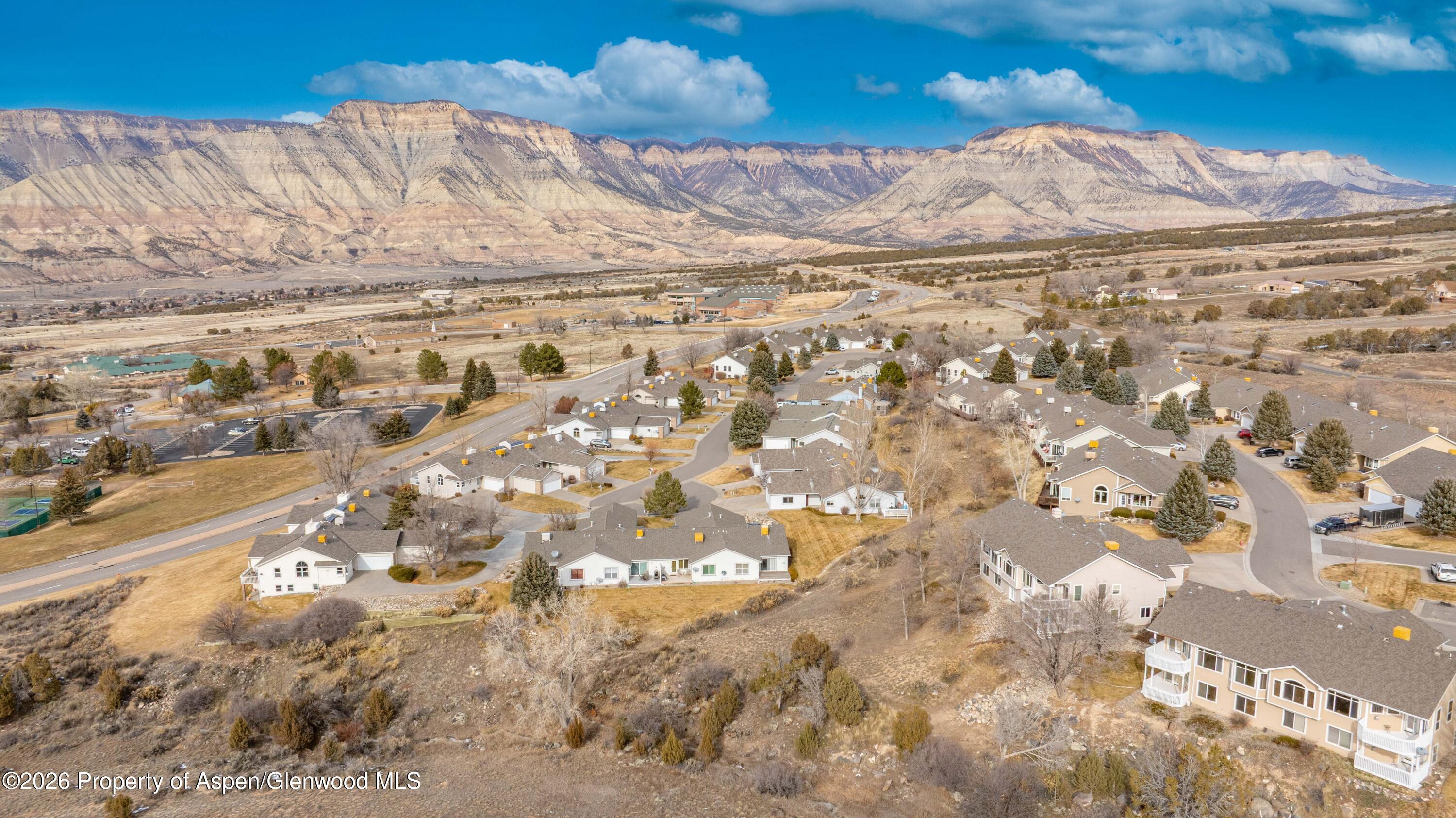 25 West Ridge Court Parachute, CO 81635 - Photo 18 of 21 a view of snow on the side of a road