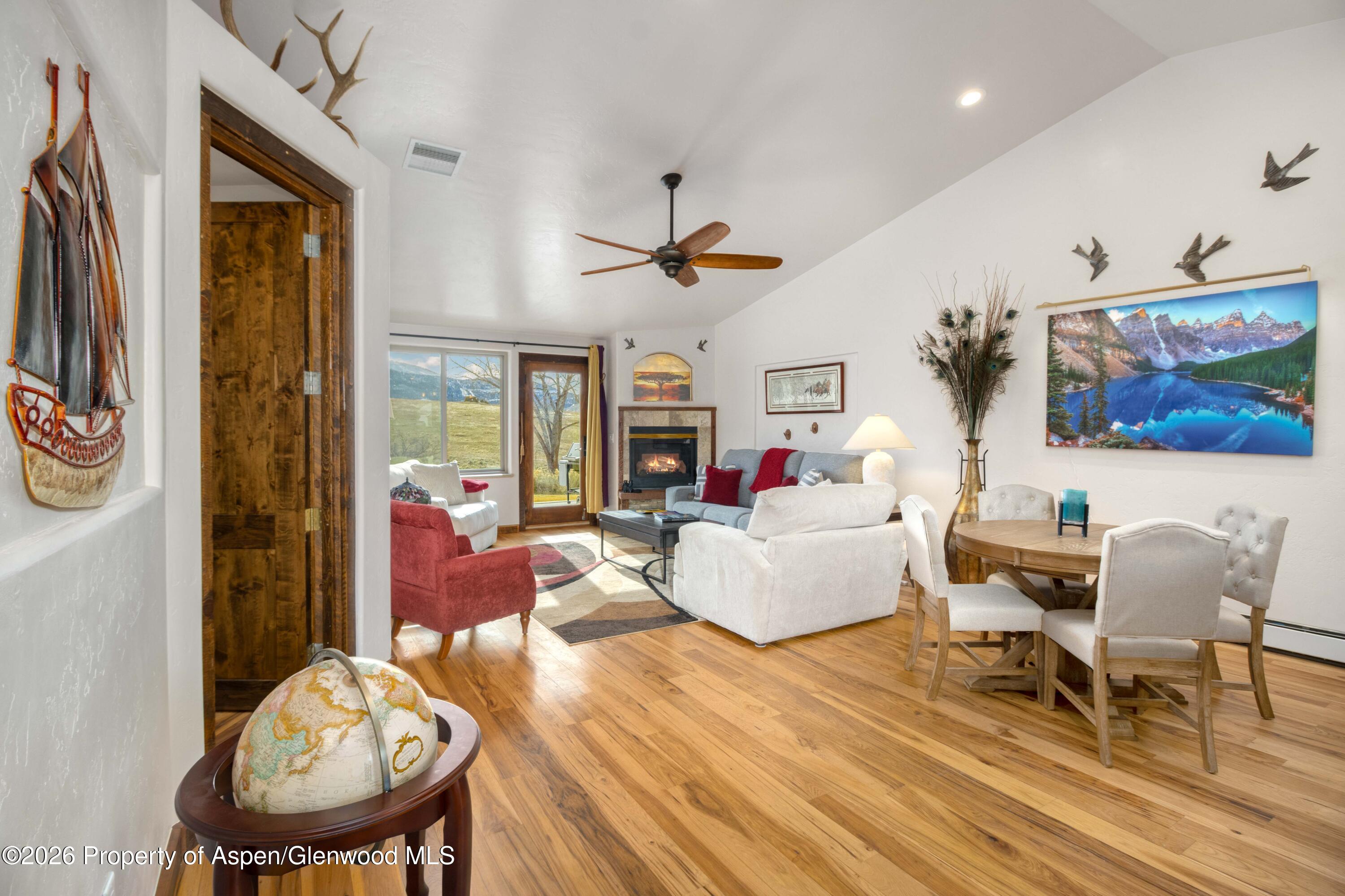 25 West Ridge Court Parachute, CO 81635 - Photo 3 of 21 a living room with furniture and a table