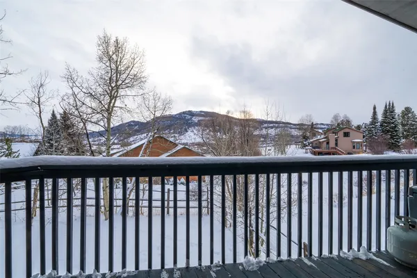 a view of a street from a balcony