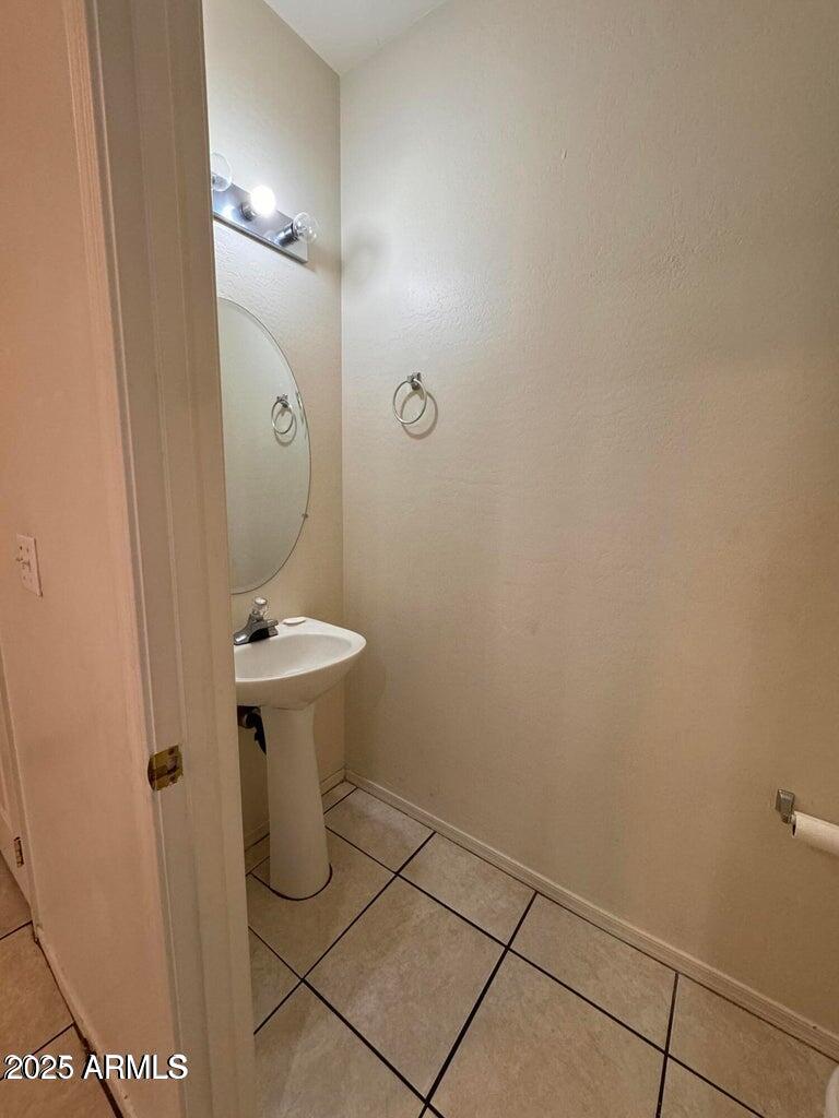 1207 West Monroe Street Phoenix, AZ 85007 - Photo 11 of 16 a bathroom with a sink
