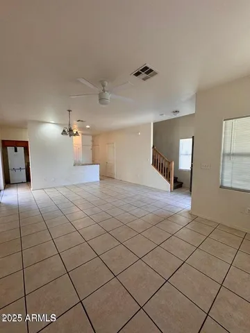 a view of a livingroom and window
