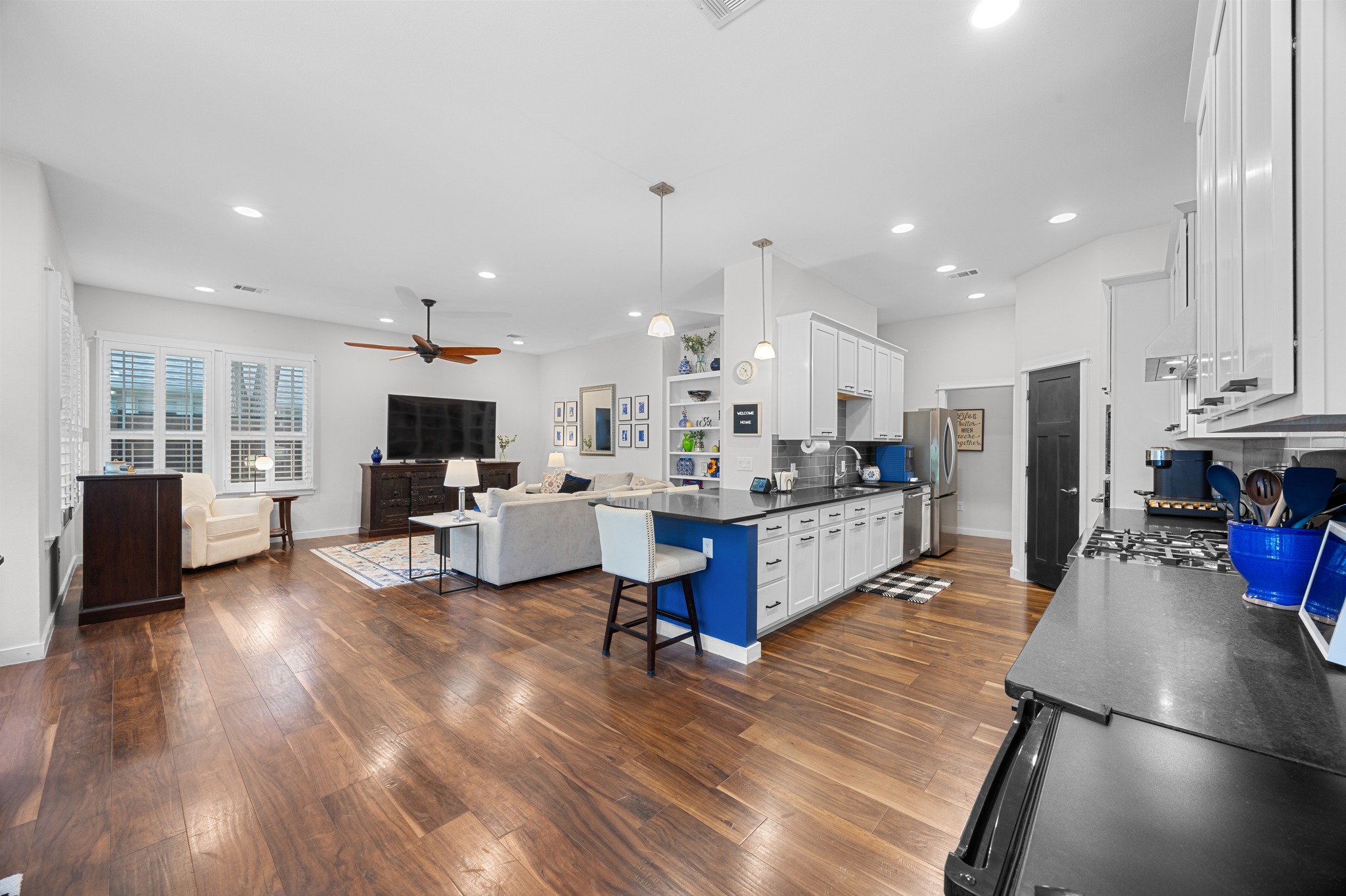 3907 Becker Avenue Austin, TX 78751 - Photo 33 of 33 Open floor plan. Rich wood floors, custom shutters, recessed lighting