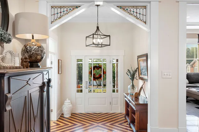 a view of entryway with a chandelier