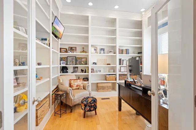 a view of a workspace with furniture