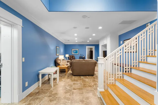 a view of a living room and dining room