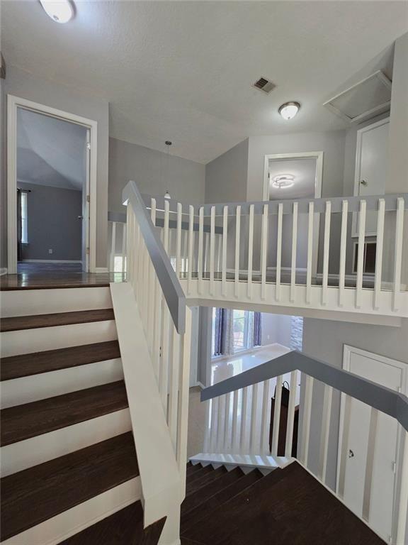 6992 Ivy Pointe Row Austell, GA 30168 - Photo 17 of 30 a view of entryway with wooden floor
