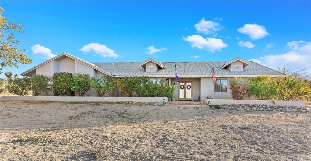 1225 Locust Road Pinon Hills, CA 92372 - Photo 1 of 1 a view of a house with a yard and a large tree