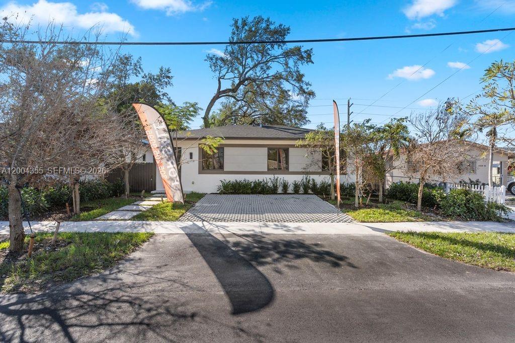 4518 Northwest 4th Street Miami, FL 33126 - Photo 23 of 23 a view of a house with a street