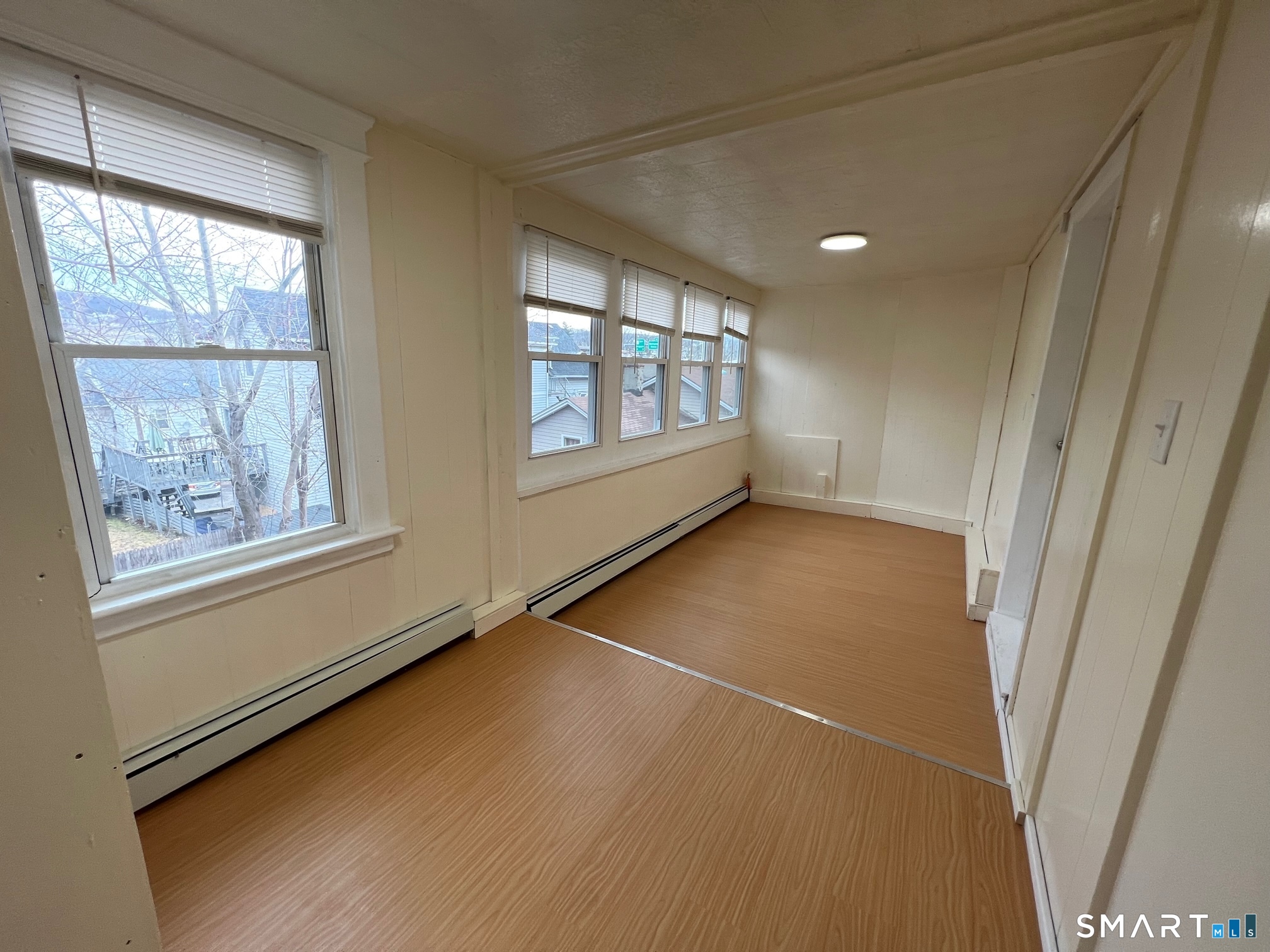 62 North Leonard Street Waterbury, CT 06708 - Photo 13 of 13 a view of an empty room with a window