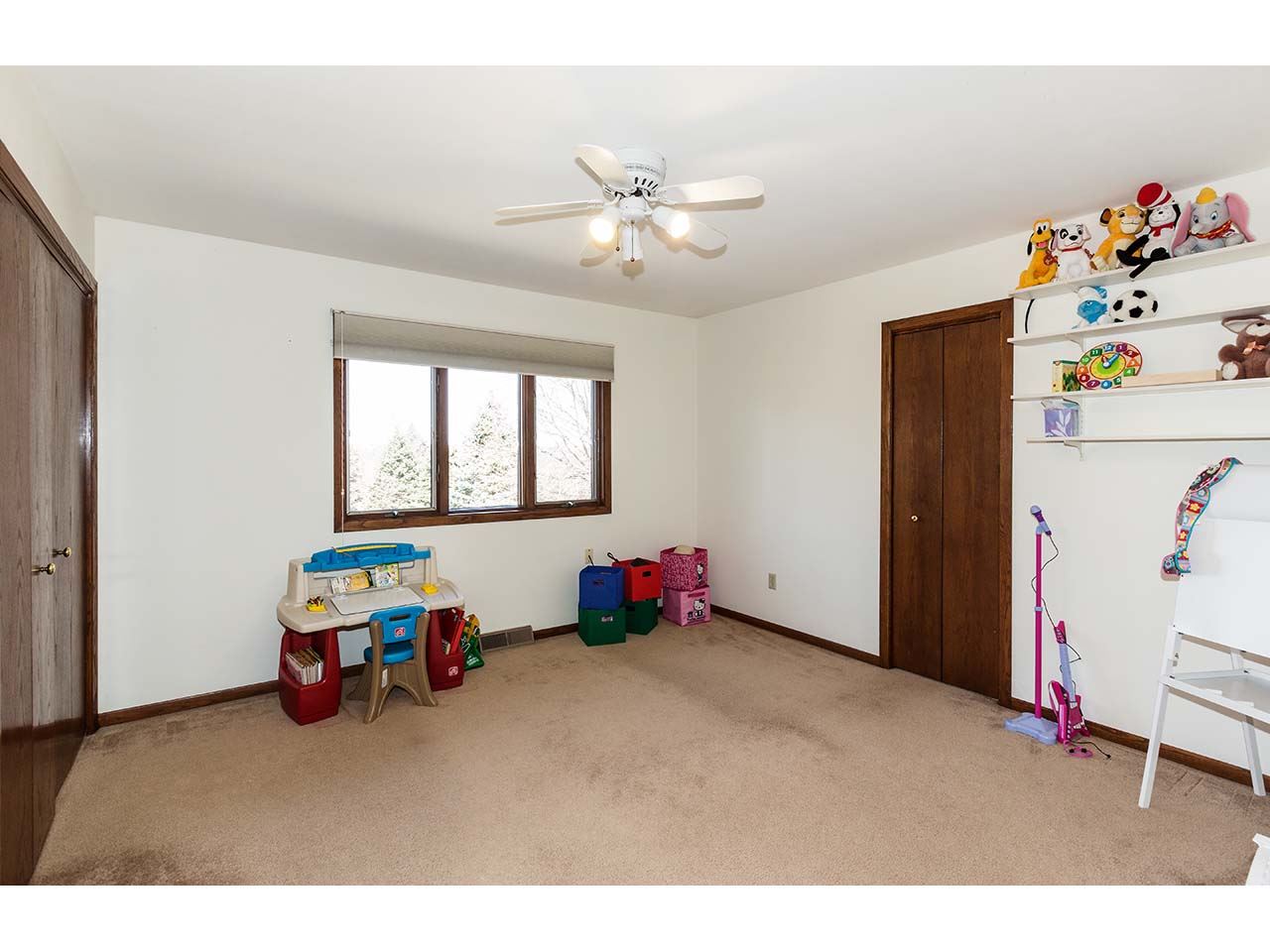 4571 East Marrill Road Byron, IL 61010 - Photo 14 of 25 a children room with toys and a window