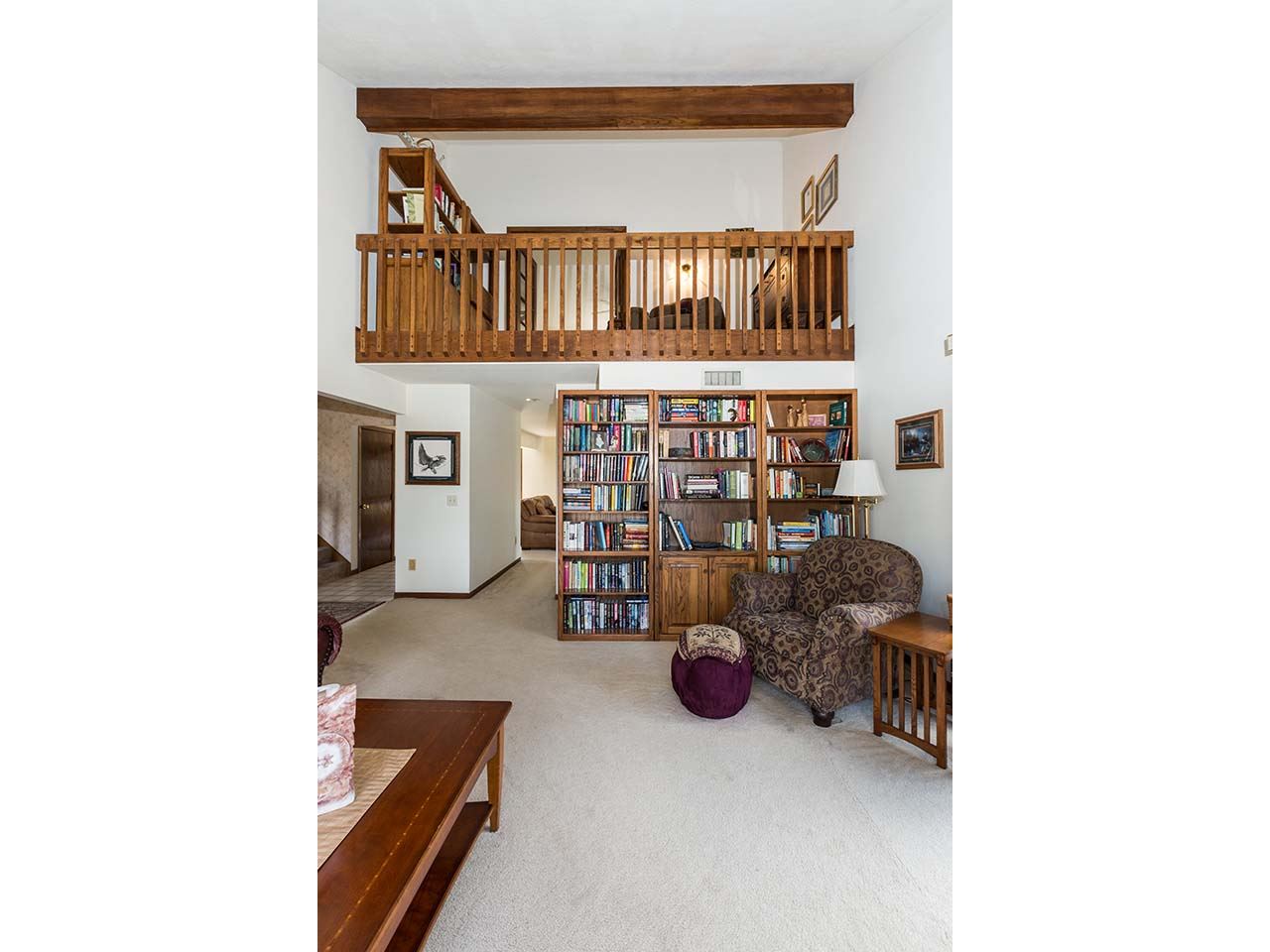 4571 East Marrill Road Byron, IL 61010 - Photo 17 of 25 a view of living room with furniture and a book shelf