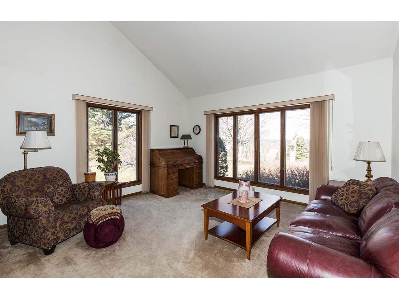 4571 East Marrill Road Byron, IL 61010 - Photo 2 of 25 a living room with furniture ceiling fan and a window