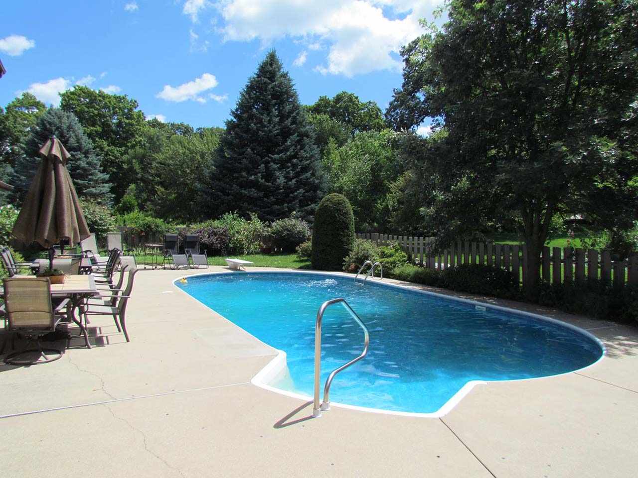 4571 East Marrill Road Byron, IL 61010 - Photo 22 of 25 a view of a swimming pool with a patio
