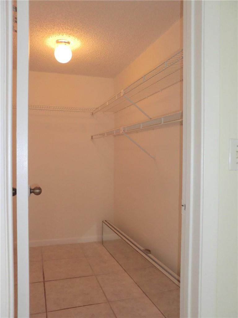 6796 Palmetto Circle South, Unit 101 Boca Raton, FL 33433 - Photo 17 of 29 a view of an empty room