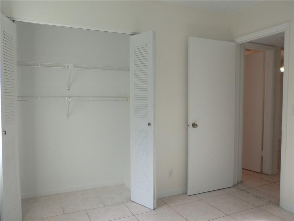6796 Palmetto Circle South, Unit 101 Boca Raton, FL 33433 - Photo 19 of 29 a view of an empty room