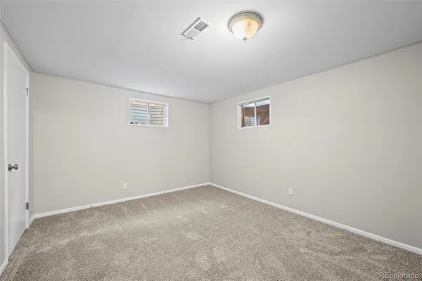 an empty room with a workbench