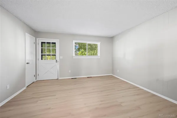 an empty room with windows