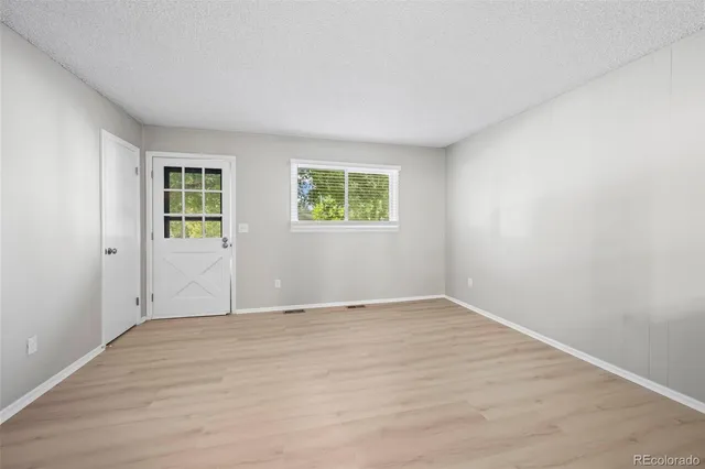 an empty room with windows