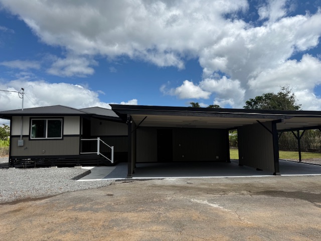 144 Chong Street Hilo, HI 96720 - Photo 1 of 28 a view of a car garage