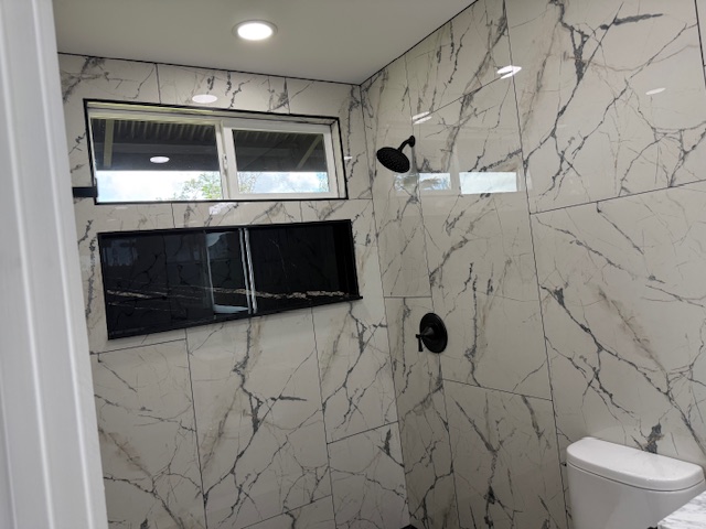 144 Chong Street Hilo, HI 96720 - Photo 12 of 28 a bathroom with a shower and a mirror