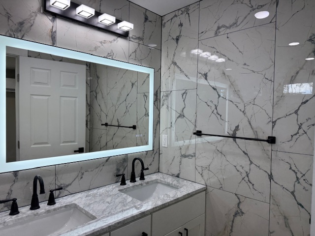 144 Chong Street Hilo, HI 96720 - Photo 13 of 28 a bathroom with a sink and a mirror