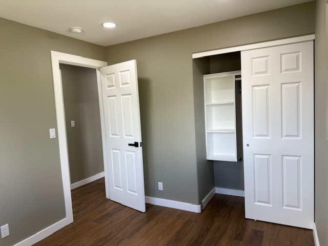 144 Chong Street Hilo, HI 96720 - Photo 16 of 28 an empty room with wooden floor and closet