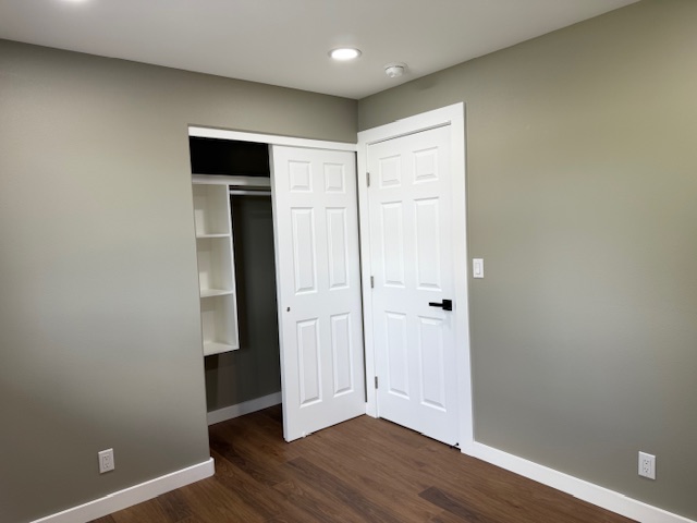 144 Chong Street Hilo, HI 96720 - Photo 18 of 28 a view of an empty room with wooden floor