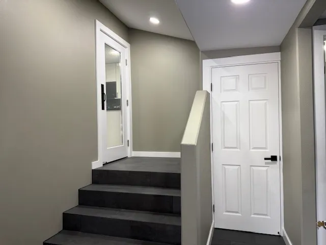 a view of entryway with wooden floor